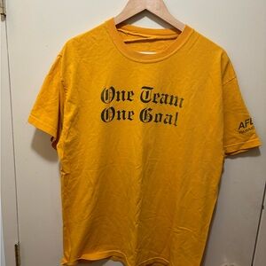 Yellow vintage AFLAC Hawaii Pacific One Team One Goal t-shirt